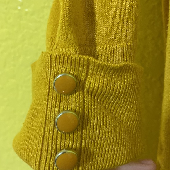 It’s a yellow mustard color sweater great condition. - Picture 2 of 4